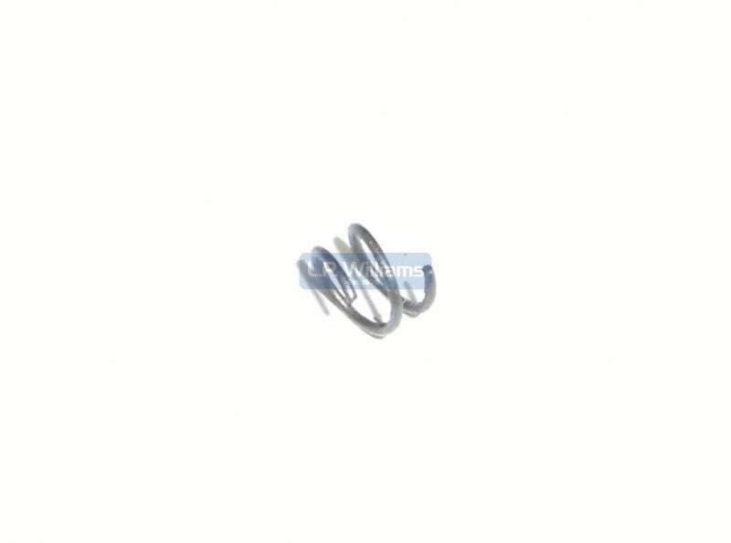 Oil metering screw spring